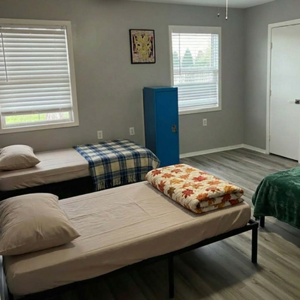 Clean, comfortable bedroom accommodations at Katy Youth Care
